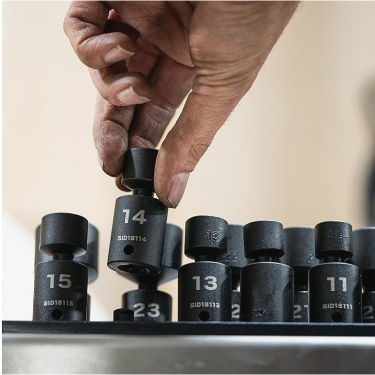 Hand selecting a KISTAR NOBLE impact socket from an organized rail